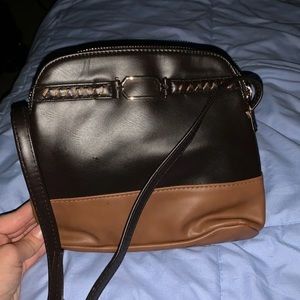 Tan and black signature.